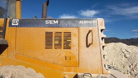 SEM wheel loader body and model-marking area